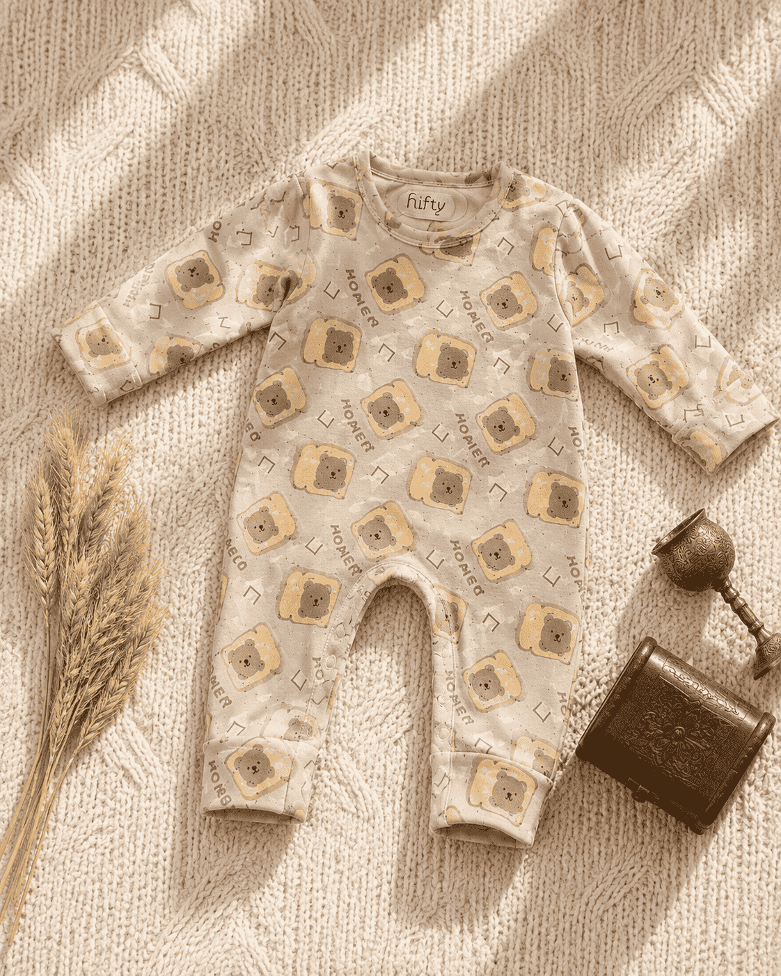 Cream baby romper with bear toast print