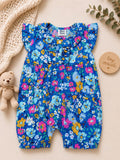 Baby girl royal blue sleeveless romper with vibrant pink and yellow floral print and ruffle collar.