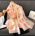 Cream silk-satin scarf with bright pink tulip floral print and peach border