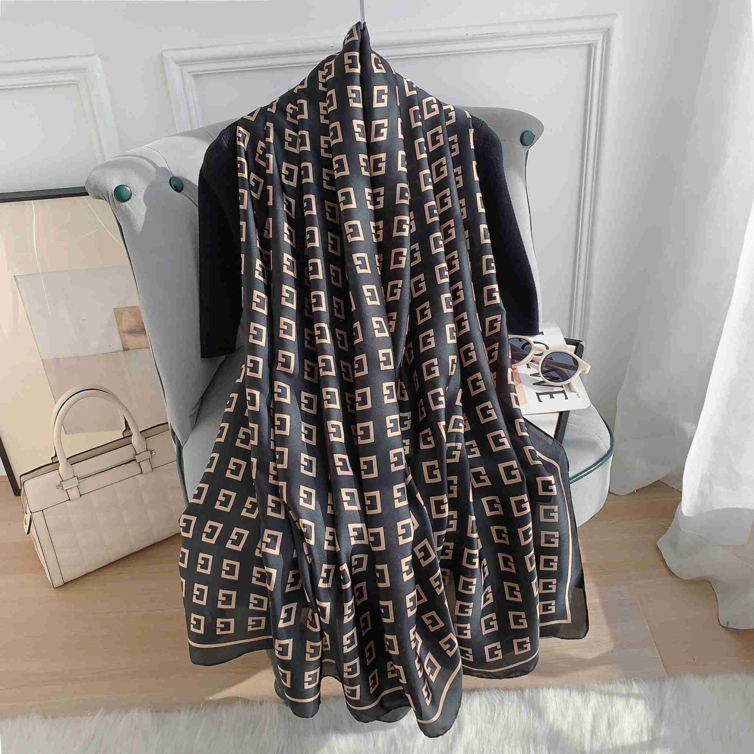 Black silk scarf with gold monogram G-pattern and bordered