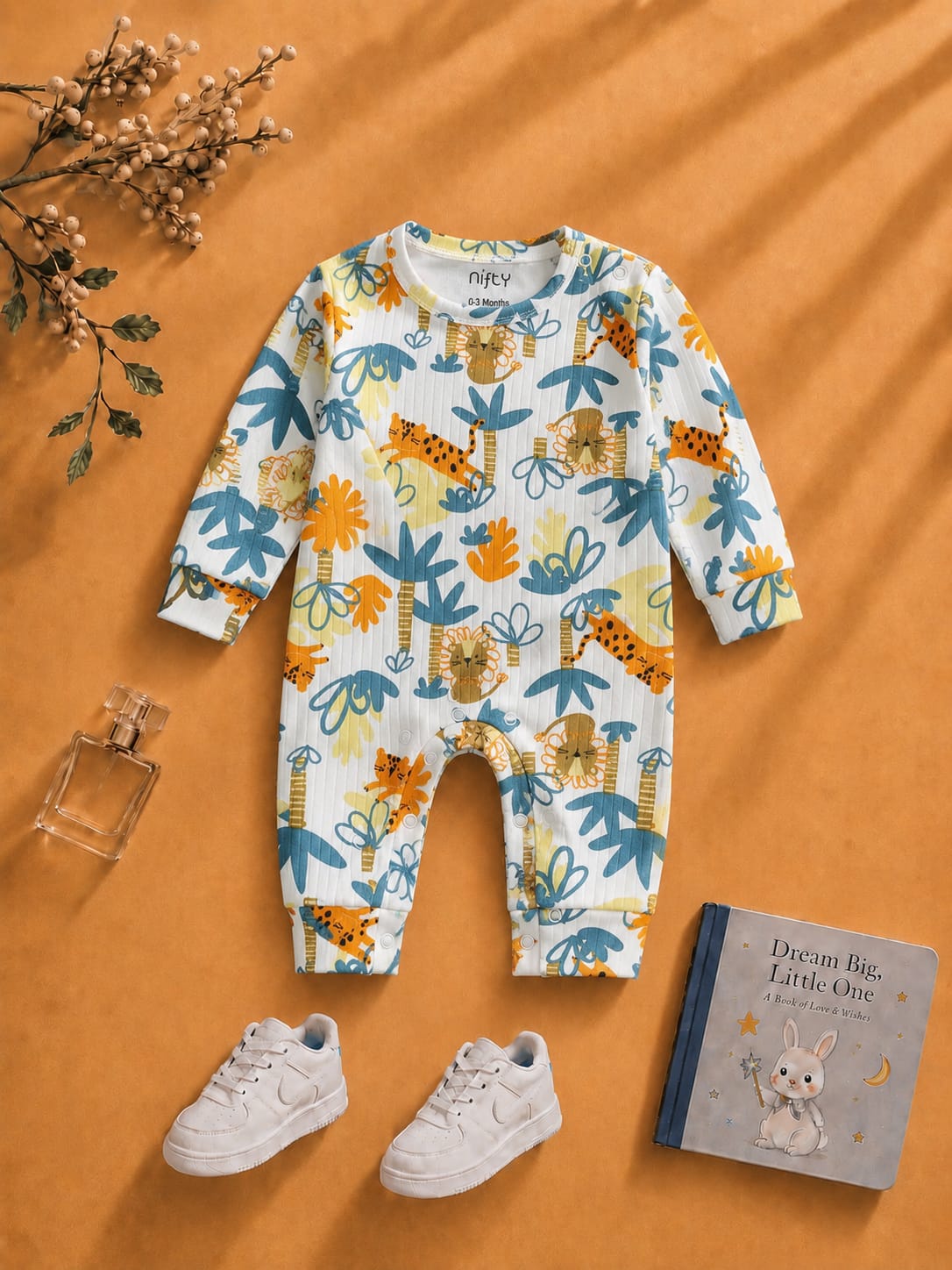 Cream baby romper with jungle animal print