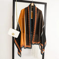 Silk-satin scarf featuring large geometric blocks of brown, orange, and black with a terracotta-colored "H" pattern border