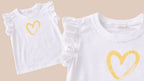Girls white shirt and yellow shorts set with heart print in Pakistan by Basics by Nifty, soft breathable summer co-ord outfit for kids
