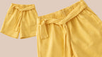 Girls white shirt and yellow shorts set with heart print in Pakistan by Basics by Nifty, soft breathable summer co-ord outfit for kids