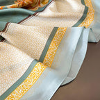 Sage green silk-satin scarf with yellow peony floral print and decorative cream border