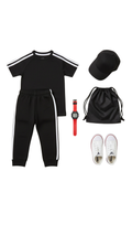 Girl wearing black t-shirt and jogger set with white side stripes