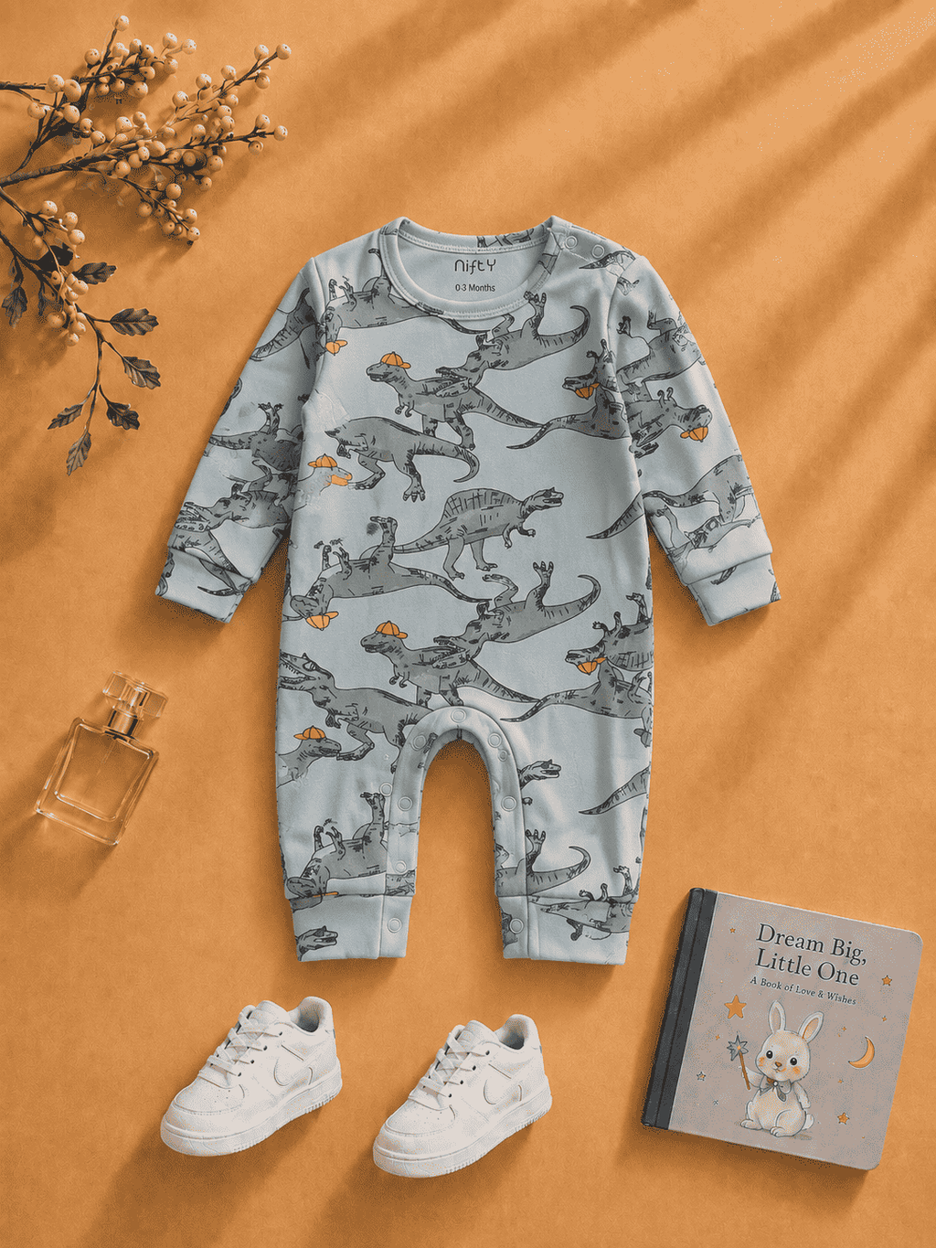 Grey blue baby romper with dinosaur print