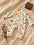 Cream baby romper with jungle animal print